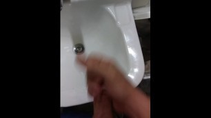 Pissing in the sink at work and jerking off