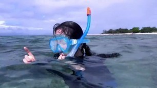 asian snorkeling woman