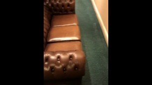 Naughty piss on a couch