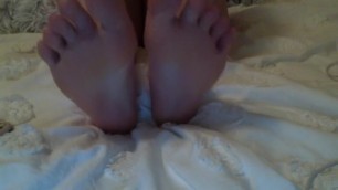 spitting and rubbing my tiny dirty feet while kinda breathing heavy