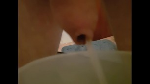 First video. Pee in measuring cup