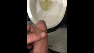 Uncut cock pissing