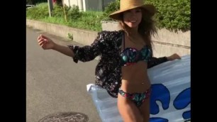 Japanese Girl on vacation showing some abs