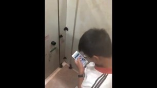Chinese man fapping in public toilet