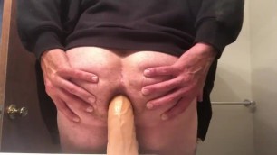 Taking a 14 inch cock balls deep up his ass.