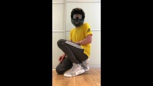 Jerking off in Adidas trackies and sneakers, with MX helmet