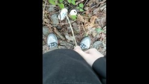 Peeing on Some Cans in the Woods