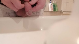 Pissing out of my pierced cock