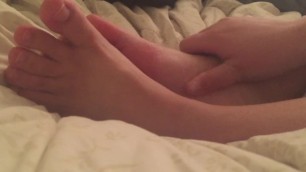 Rubbing my Feet After a Long Day of Work