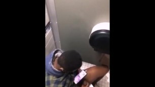 black guy in toilet jerking spiting cum