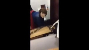 Chinese MILF fucked while playing music