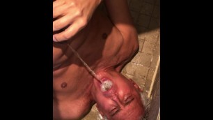 Loser pissing on his face!