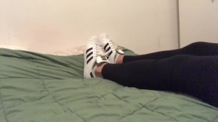 Teasing you in bed wearing white ankle socks and sneakers