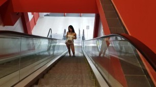 I'm going to the escalator and showing boobs