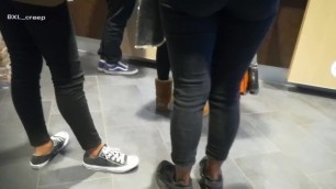 Ebony teen with delicious bubble butt in tight black jeans. Candid ass!
