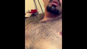 Hairy chest stroking the meat