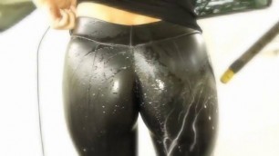 Girl in Tight Latex Pants goes to the Car Wash