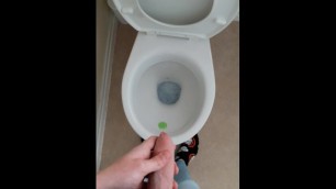 Teen pissing in public toilet