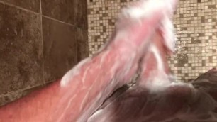 Shower masturbation. Stroking my shaved cock in the shower.