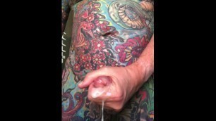 Jacques Kiros shows his own full body tattoo, masturbates and cums