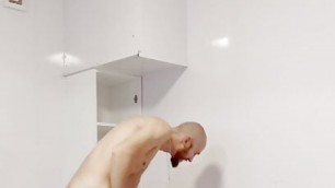 A long-legged whore guy takes a shower