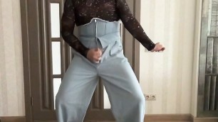 Crossdresser in blue high waist corset jeans, crop top and high heels cum and dance for her BDSM master like a cuckold