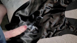 Making a mess all over the satin lining of a black dress
