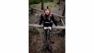 Sissy Alexandra is waiting for men in the forest while wearing thigh high boots