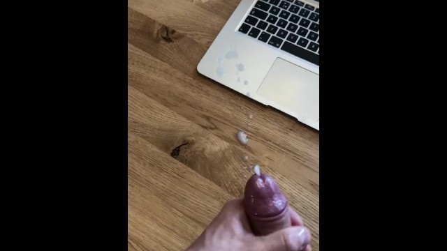 Stroking till cumshot, watching homemade video.