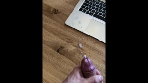 Stroking till cumshot, watching homemade video.