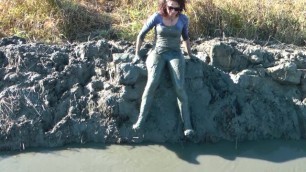 Blue Leggings Pants Wet and Mud Brunette Girl