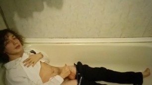 tired after a hard day a schoolboy masturbates in the bathroom with his clothes on