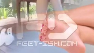 Asian Gives Footjob To Cucumber